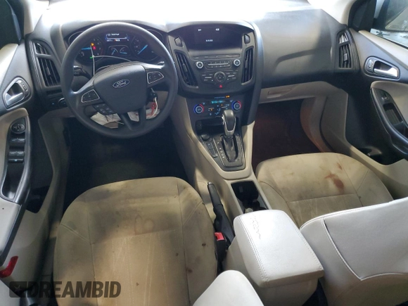 2018 Ford Focus SE z VIN 1FADP3FE9JL234158, wystawiony jako Copart lot #51788755 z przebiegiem 99 877 mil mil oraz Szkoda całkowita • Salvage title. Historia ofert i sprzedaży dostępna na DreamBid. Obrazek 8.