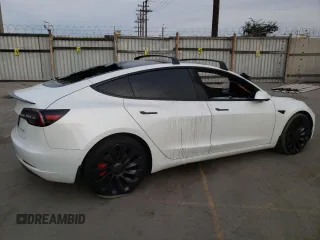 2022 Tesla Model 3 Performance with VIN 5YJ3E1EC3NF265334, listed as a Copart auction lot 84853734 with Not Provided miles and Salvage Title. Bid and sale history available at DreamBid. Image 3.