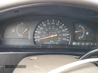 1999 Toyota Tacoma z VIN 4TANL42N4XZ435246, wystawiony jako Copart lot #56843025 z przebiegiem 197 295 mil mil oraz Szkoda całkowita • Salvage title. Historia ofert i sprzedaży dostępna na DreamBid. Obrazek 9.