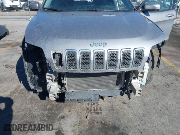 2020 Jeep Cherokee Latitude with VIN 1C4PJLCB0LD536471, listed as a IAAI auction lot 41680568 with 150,397 mi miles and . Bid and sale history available at DreamBid. Image 6.