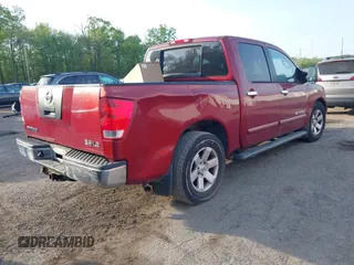 2007 Nissan Titan XE with VIN 1N6BA07A87N231789, listed as a IAAI auction lot 42111290 with 272,425 mi miles. Bid and sale history available at carsss.com. Image 4.
