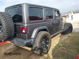 2019 Jeep Wrangler Unlimited Sahara with VIN 1C4HJXEG7KW661801, listed as a IAAI auction lot 40848731 with Not provided miles and . Bid and sale history available at DreamBid. Image 4.