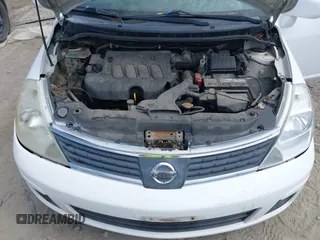 2007 Nissan Versa SL z VIN 3N1BC13E07L394998, wystawiony jako IAAI lot #42193381 z przebiegiem 198 737 mil mil oraz . Historia ofert i sprzedaży dostępna na DreamBid. Obrazek 10.