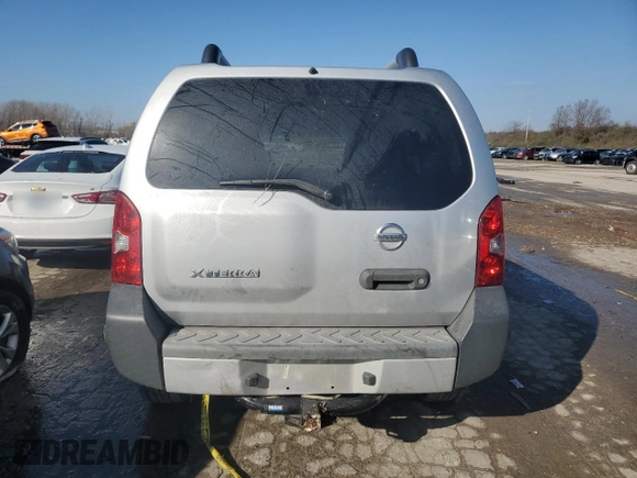 2014 Nissan Xterra X with VIN 5N1AN0NW1EN804235, listed as a Copart auction lot 83661084 with 103,482 mi miles and Salvage Title. Bid and sale history available at DreamBid. Image 6.