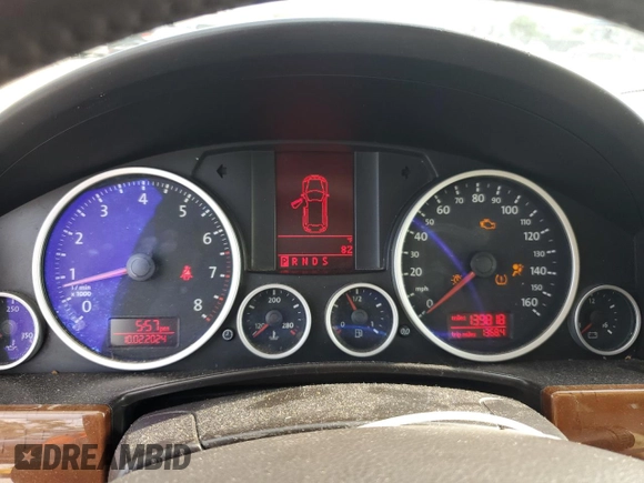 2008 Volkswagen Touareg V6 z VIN WVGBE77L78D052289, wystawiony jako Copart lot #58817765 z przebiegiem 139 818 mil mil oraz Tytuł czysty. Historia ofert i sprzedaży dostępna na DreamBid. Obrazek 9.