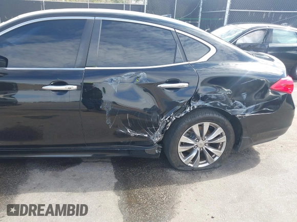 2012 Infiniti M Hybrid with VIN JN1EY1AP3CM910371, listed as a IAAI auction lot 41706126 with 237,749 mi miles and . Bid and sale history available at DreamBid. Image 6.