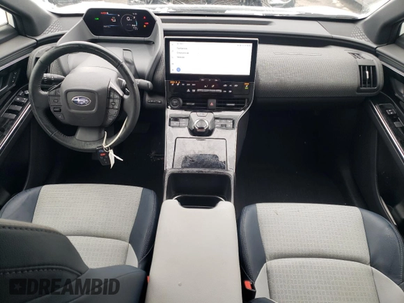 2023 Subaru Solterra Limited z VIN JTMABABA7PA022169, wystawiony jako Copart lot #43947795 z przebiegiem 18 415 mil mil oraz Szkoda całkowita • Salvage title. Historia ofert i sprzedaży dostępna na DreamBid. Obrazek 8.