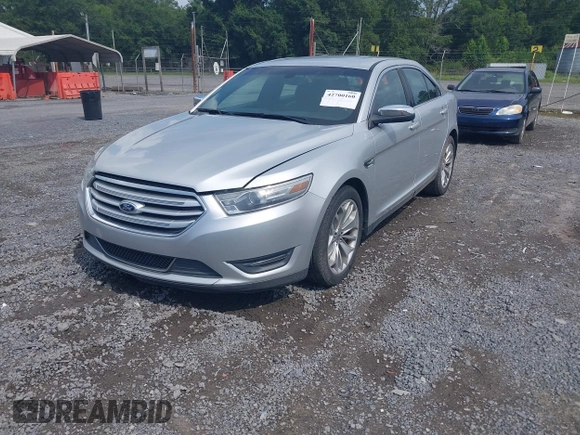 2013 Ford Taurus Limited with VIN 1FAHP2F87DG235392, listed as a IAAI auction lot 42700160 with 123,904 mi miles and . Bid and sale history available at DreamBid. Image 2.