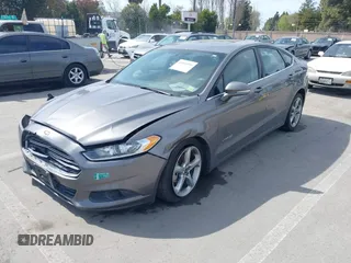 2014 Ford Fusion SE Hybrid with VIN 3FA6P0LU4ER195506, listed as a IAAI auction lot 41859599 with 159,374 mi miles. Bid and sale history available at carsss.com. Image 2.
