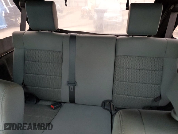 2008 Jeep Wrangler Unlimited Sahara with VIN 1J4GA59148L574934, listed as a Copart auction lot 74590164 with 134,674 mi miles and Salvage title. Bid and sale history available at DreamBid. Image 10.