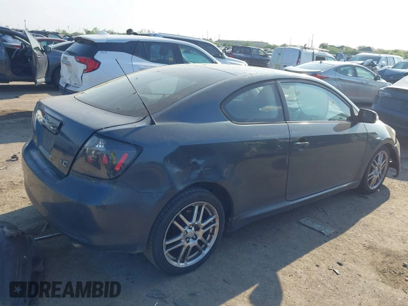 2005 Scion tC with VIN JTKDE177150041877, listed as a IAAI auction lot 41877581 with 240,179 mi miles. Bid and sale history available at carsss.com. Image 4.