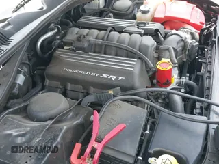 2022 Dodge Challenger R/T Scat Pack Widebody z VIN 2C3CDZFJ3NH151508, wystawiony jako IAAI lot #42812032 z przebiegiem 26 122 mil mil oraz . Historia ofert i sprzedaży dostępna na DreamBid. Obrazek 18.