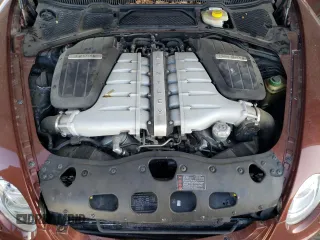 2007 Bentley Continental GT with VIN SCBDR33W77C047935, listed as a Copart auction lot 60557985 with 61,661 mi miles and Salvage title. Bid and sale history available at DreamBid. Image 11.