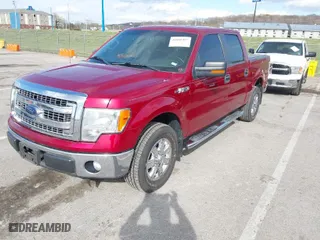 2013 Ford F-150 XL with VIN 1FTFW1CF1DKE27969, listed as a IAAI auction lot 41860397 with 194,938 mi miles. Bid and sale history available at carsss.com. Image 2.