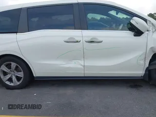 2019 Honda Odyssey EX-L with VIN 5FNRL6H70KB083596, listed as a IAAI auction lot 42072667 with 153,087 mi miles and . Bid and sale history available at DreamBid. Image 18.