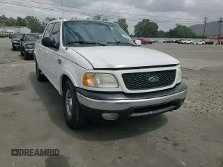 2002 Ford F-150 XLT with VIN 1FTRW07L52KA04929, listed as a Copart auction lot 54491815 with 169,132 mi miles and Salvage Title. Bid and sale history available at carsss.com. Image 13.
