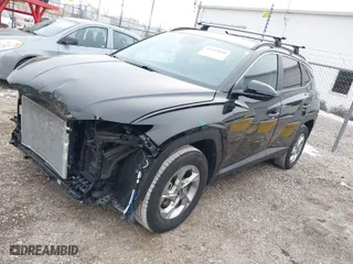 2022 Hyundai Tucson SEL with VIN 5NMJBCAEXNH141045, listed as a IAAI auction lot 41433930 with 46,863 mi miles. Bid and sale history available at carsss.com. Image 2.