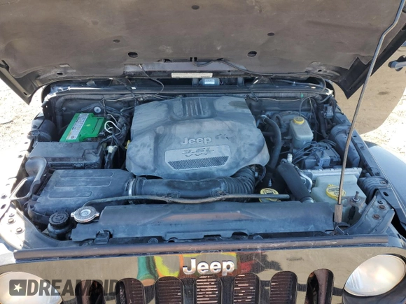 2012 Jeep Wrangler Sahara z VIN 1C4AJWBG1CL216425, wystawiony jako Copart lot #48377825 z przebiegiem 99 649 mil mil oraz Szkoda całkowita • Salvage title. Historia ofert i sprzedaży dostępna na DreamBid. Obrazek 11.