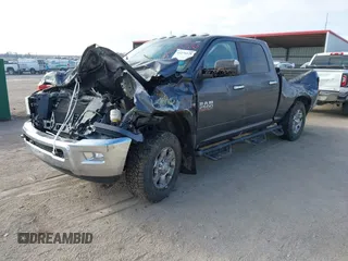 2018 Ram 2500 Big Horn with VIN 3C6UR5DJ8JG283615, listed as a IAAI auction lot 41276125 with 72,740 mi miles. Bid and sale history available at carsss.com. Image 2.