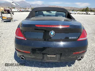 2009 BMW 6 Series 650i with VIN WBAEB53569C224337, listed as a Copart auction lot 68148974 with 75,057 mi miles and Salvage Title. Bid and sale history available at carsss.com. Image 6.