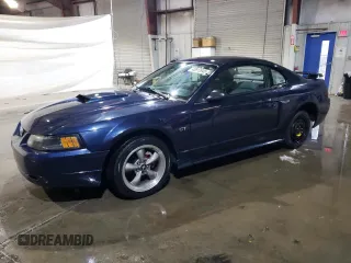 2001 Ford Mustang GT Deluxe with VIN 1FAFP42X61F186011, listed as a Copart auction lot 43812845 with 96,864 mi miles and Salvage Title. Bid and sale history available at carsss.com. Image 1.