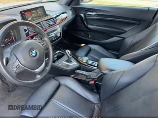 2018 BMW 2 Series 230i xDrive with VIN WBA2K1C55JVB64560, listed as a IAAI auction lot 41616166 with 69,414 mi miles. Bid and sale history available at carsss.com. Image 5.