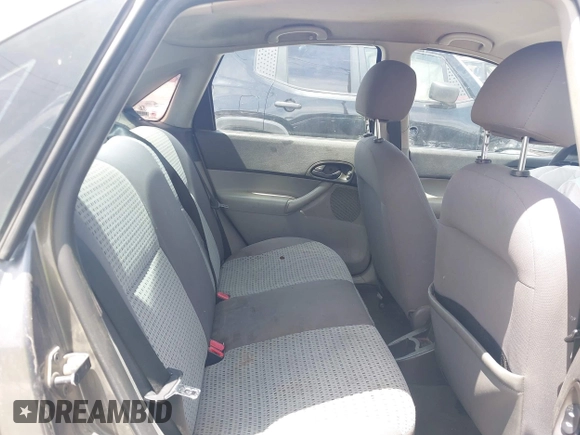 2007 Ford Focus S z VIN 1FAFP34N17W123378, wystawiony jako IAAI lot #42208033 z przebiegiem 183 803 mil mil oraz . Historia ofert i sprzedaży dostępna na DreamBid. Obrazek 8.