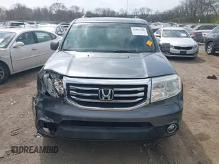 2012 Honda Pilot EX-L with VIN 5FNYF4H53CB026381, listed as a IAAI auction lot 41802360 with 165,425 mi miles and . Bid and sale history available at DreamBid. Image 12.