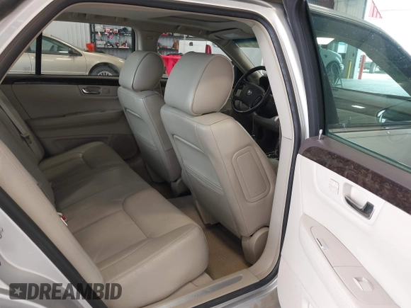 2011 Cadillac DTS Luxury Collection z VIN 1G6KD5E66BU119869, wystawiony jako IAAI lot #42221509 z przebiegiem 92 478 mil mil oraz . Historia ofert i sprzedaży dostępna na DreamBid. Obrazek 8.