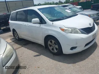 2014 Toyota Sienna LE AAS with VIN 5TDKK3DC0ES525654, listed as a IAAI auction lot 42153582 with 71,258 mi miles. Bid and sale history available at carsss.com. Image 1.