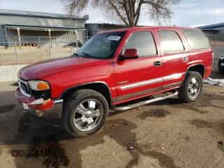 2001 GMC Yukon SLT with VIN 1GKEK13T91J268864, listed as a Copart auction lot 84973914 with 236,212 mi miles and Salvage Title. Bid and sale history available at carsss.com. Image 1.