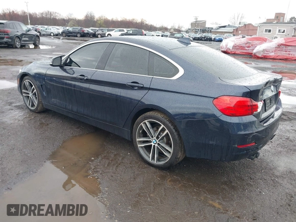2016 BMW 4 Series 428i xDrive with VIN WBA4C9C59GG137067, listed as a IAAI auction lot 41913733 with 104,378 mi miles and . Bid and sale history available at carsss.com. Image 3.