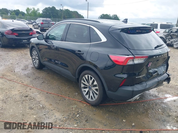 2021 Ford Escape Titanium Hybrid z VIN 1FMCU0DZ0MUA16798, wystawiony jako IAAI lot #42502086 z przebiegiem 107 250 mil mil oraz . Historia ofert i sprzedaży dostępna na DreamBid. Obrazek 3.