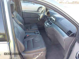 2010 Honda Odyssey EX-L with VIN 5FNRL3H6XAB061092, listed as a IAAI auction lot 41645143 with 165,941 mi miles. Bid and sale history available at carsss.com. Image 5.