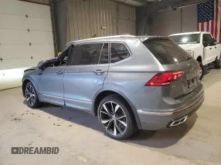 2023 Volkswagen Tiguan SEL R-Line with VIN 3VV4B7AX3PM072402, listed as a Copart auction lot 56656515 with 13,686 mi miles and Salvage title. Bid and sale history available at DreamBid. Image 2.