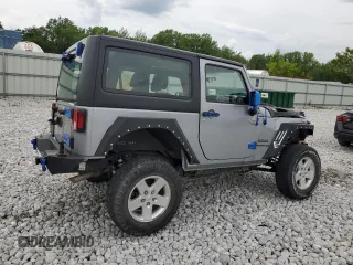 2015 Jeep Wrangler Sport with VIN 1C4AJWAG8FL540932, listed as a Copart auction lot 61870935 with 71,762 mi miles and Salvage title. Bid and sale history available at DreamBid. Image 3.