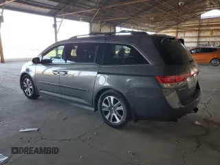 2014 Honda Odyssey Touring with VIN 5FNRL5H99EB111525, listed as a Copart auction lot 61986005 with 137,905 mi miles and Salvage title. Bid and sale history available at DreamBid. Image 2.
