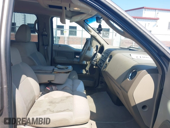 2004 Ford F-150 XLT with VIN 1FTPW12594KC19982, listed as a IAAI auction lot 42620812 with 183,238 mi miles and . Bid and sale history available at DreamBid. Image 5.