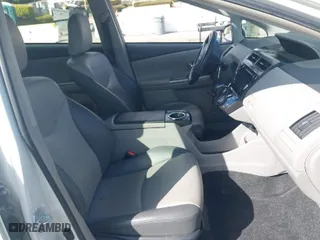 2017 Toyota Prius v Two with VIN JTDZN3EU9HJ063285, listed as a IAAI auction lot 41696704 with 411,285 mi miles. Bid and sale history available at carsss.com. Image 5.