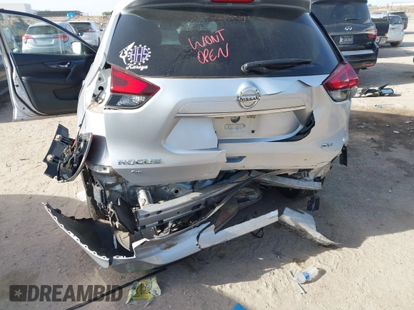 2019 Nissan Rogue SV with VIN KNMAT2MT0KP527901, listed as a IAAI auction lot 42260779 with 102,975 mi miles and . Bid and sale history available at DreamBid. Image 6.