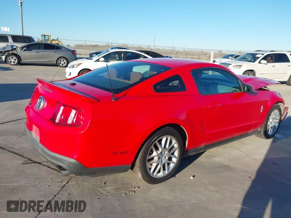 2012 Ford Mustang V6 Premium with VIN 1ZVBP8AM5C5262332, listed as a IAAI auction lot 41243050 with 105,157 mi miles. Bid and sale history available at carsss.com. Image 4.