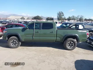 2021 Toyota Tacoma 4WD SR5 with VIN 3TMDZ5BN2MM101265, listed as a IAAI auction lot 41272874 with 51,989 mi miles. Bid and sale history available at carsss.com. Image 15.