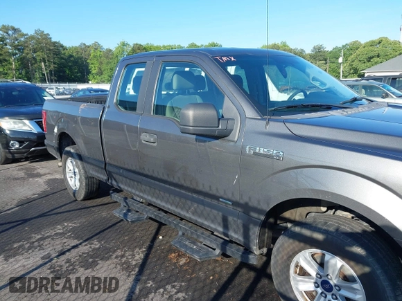 2015 Ford F-150 XLT with VIN 1FTEX1EP7FKE96165, listed as a IAAI auction lot 42262766 with 260,250 mi miles and . Bid and sale history available at DreamBid. Image 13.