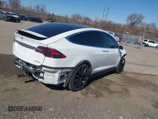 2018 Tesla Model X 75D with VIN 5YJXCAE45JF103828, listed as a IAAI auction lot 41698708 with 118,699 mi miles and . Bid and sale history available at carsss.com. Image 4.