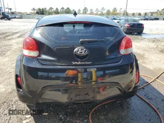 2014 Hyundai Veloster with VIN KMHTC6AD0EU207850, listed as a Copart auction lot 46986695 with 138,024 mi miles and Salvage Title. Bid and sale history available at carsss.com. Image 6.