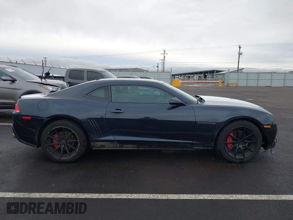 2014 Chevrolet Camaro LT z VIN 2G1FB1E3XE9265155, wystawiony jako IAAI lot #41227609 z przebiegiem 104 786 mil mil oraz . Historia ofert i sprzedaży dostępna na DreamBid. Obrazek 14.