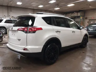 2018 Toyota RAV4 Limited with VIN JTMDFREV6JJ186499, listed as a IAAI auction lot 41668544 with 130,336 mi miles. Bid and sale history available at carsss.com. Image 4.