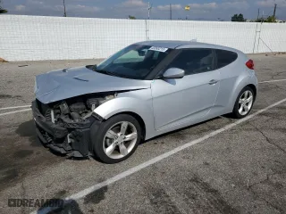 2014 Hyundai Veloster with VIN KMHTC6AD2EU186726, listed as a Copart auction lot 43993215 with 120,591 mi miles and Salvage Title. Bid and sale history available at carsss.com. Image 1.