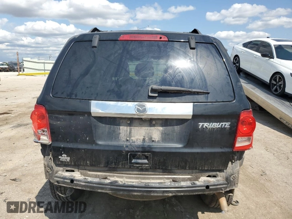 2010 Mazda Tribute Grand Touring with VIN 4F2CY0C78AKM03177, listed as a Copart auction lot 66729164 with 75,400 mi miles and Salvage Title. Bid and sale history available at carsss.com. Image 6.