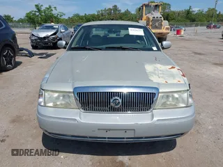 2004 Mercury Grand Marquis GS with VIN 2MEFM74W14X632470, listed as a IAAI auction lot 42120233 with 292,357 mi miles and . Bid and sale history available at DreamBid. Image 12.